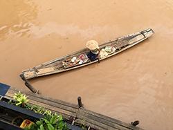 photo of woman in boat