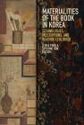 book cover image for Materialities of the Book, featuring a still life with writing brushes, books, and other objects